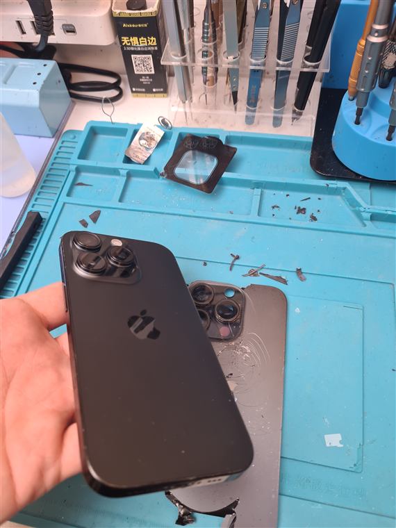 Close-up of iPhone camera module during back glass repair